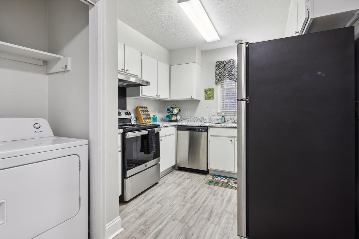 Washer and dryer connections in a Quail Run apartment home