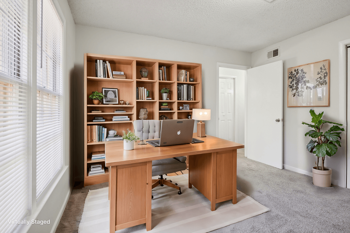 Virtually staged home office in a Quail Run apartment home