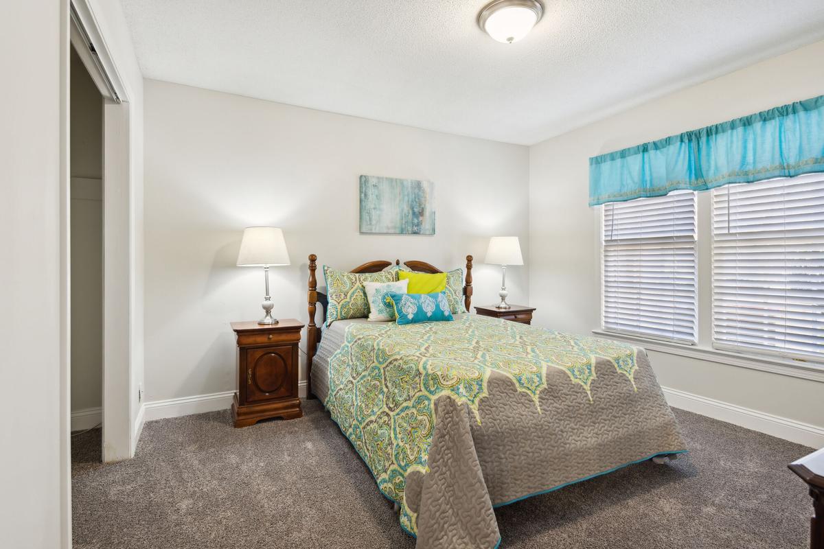 Bedroom in a Quail Run apartment home
