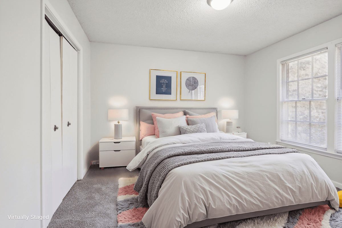 Virtually staged second bedroom in a Quail Run apartment home